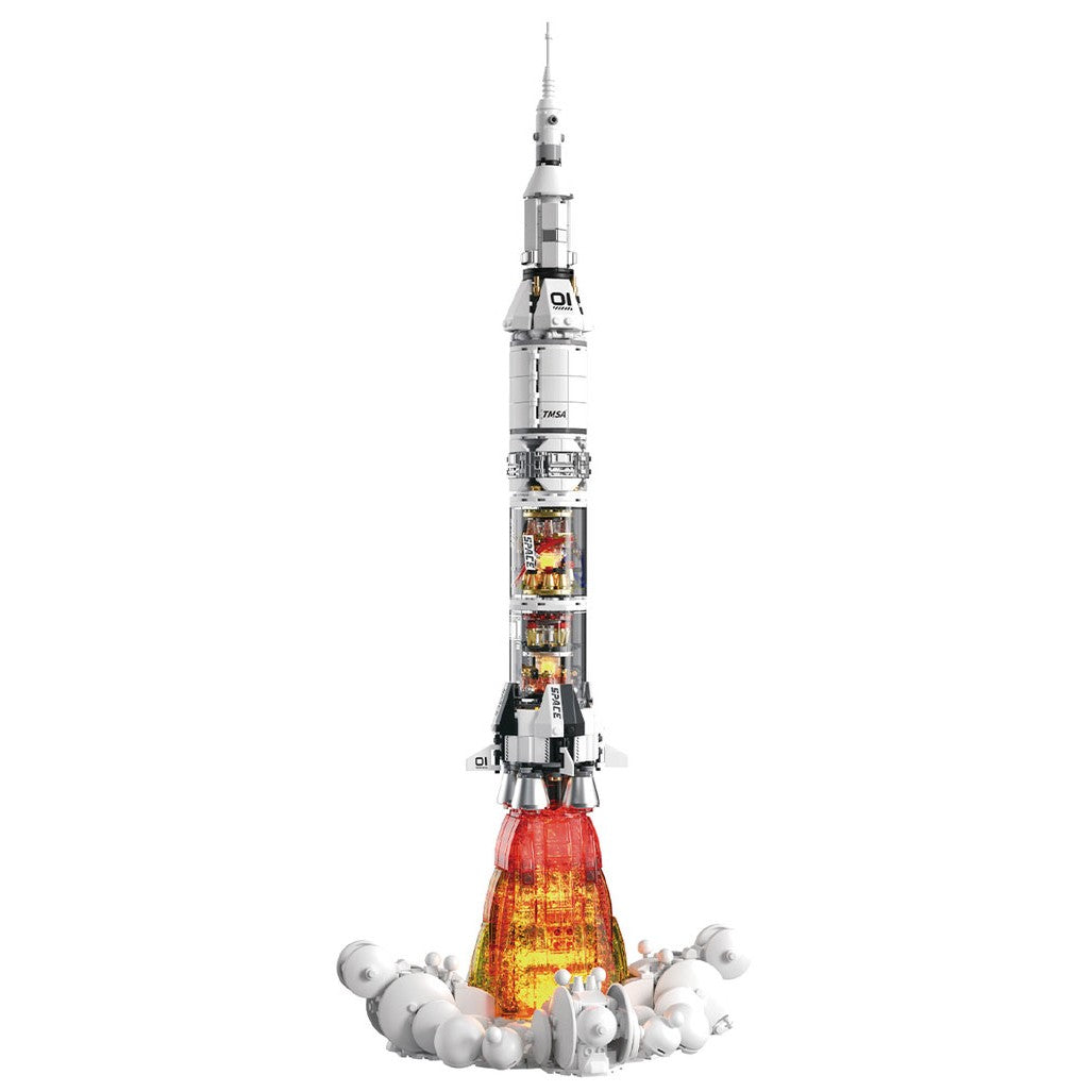 TUOMU T3006 Weltraumrakete, eine fertig gebaute weiße Rakete aus Klemmbausteinen beim Start von der Startrampe mit leuchtendem Antrieb