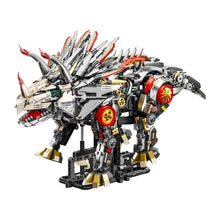 Mechanical Triceratops – MJI 13105 motorised building set – assembled fully mechanical grey and red triceratops with gold gear discs on its stand, on a white background