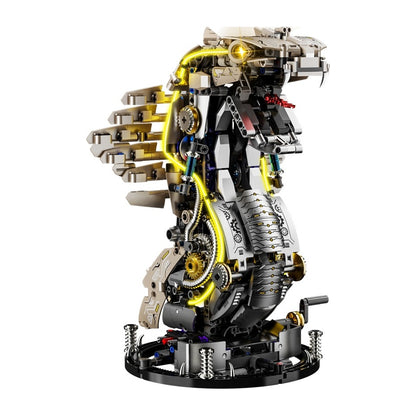 Mechanical King Cobra – MJI 13095 motorised building set – assembled mechanical king cobra (lights on, yellow light tubes) on its round base, on a white background