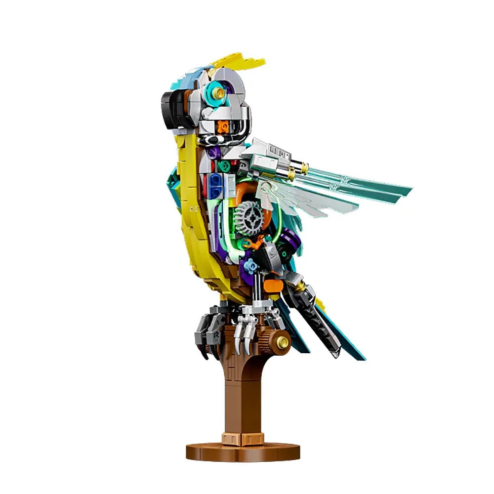 Mechanical Parrot – MJI 13052 motorised building set – assembled mechanical parrot (blue/yellow skin side) on brown perch stand, on a white background