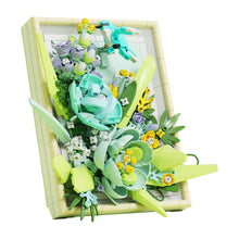 Floating Emerald Flower Picture Frame – MJI 13061 botanical building set – assembled green flower picture frame (Floating Emerald) with hummingbirds, angled view, on a white background