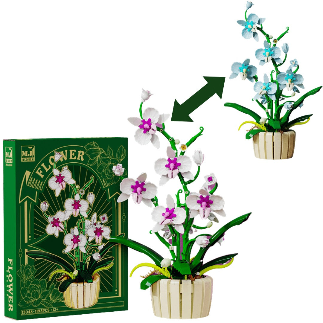 Orchid – MJI 13048 botanical building set – assembled orchid in white/magenta with its retail box and the light-blue build (both colours are in the box), on a white background