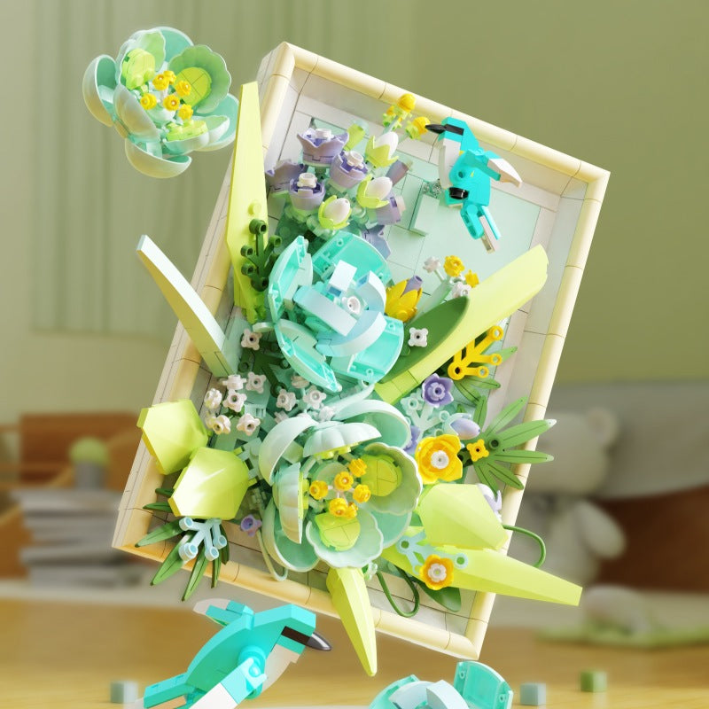 Floating Emerald Flower Picture Frame – MJI 13061 botanical building set – green frame on a shelf with floating flower and hummingbird parts
