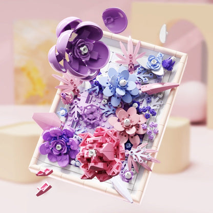 Golden Purple Flower Picture Frame – MJI 13063 botanical building set – purple frame tilted with floating flower parts, pink backdrop