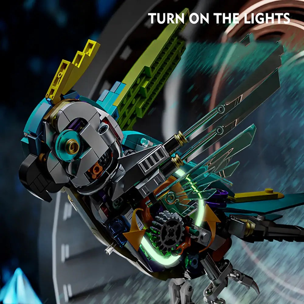 Mechanical Parrot – MJI 13052 motorised building set – close-up of the lit mechanical wing/eye with lights on