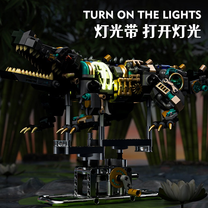 Mechanical Crocodile – MJI 13056 motorised building set – crocodile with its lights on, dark background