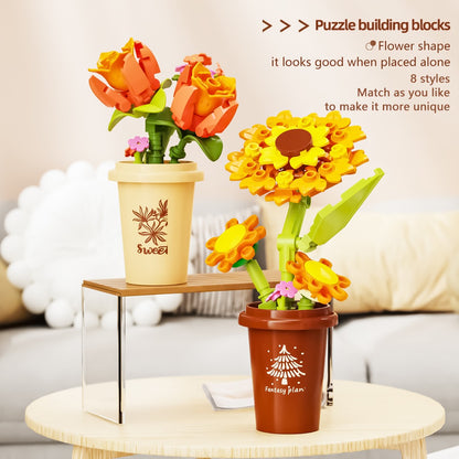 Mini Flower Pots – MJI 13033 botanical building set – two pots (orange tulips and sunflower) on an acrylic step stand, lifestyle backdrop
