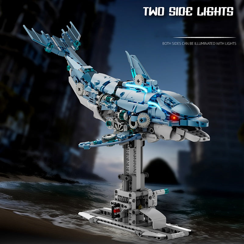Mechanical Blue Dolphin – MJI 13099 motorised building set – dolphin with its lights on in a dark city scene