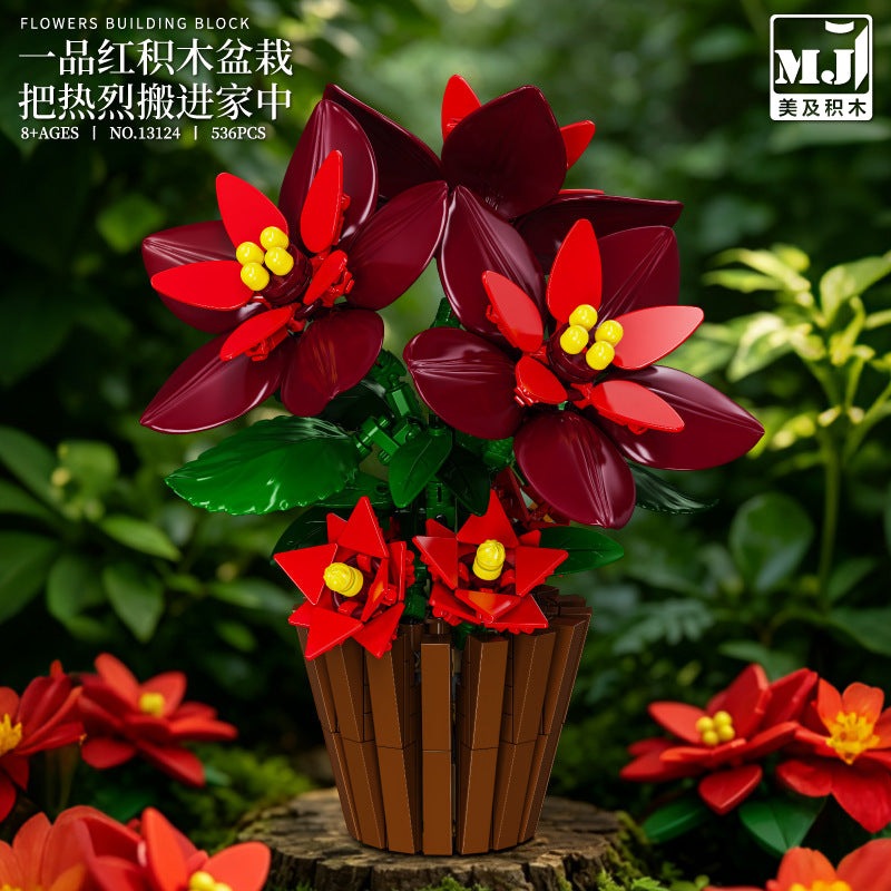 Poinsettia – MJI 13124 botanical building set – assembled model among real poinsettias