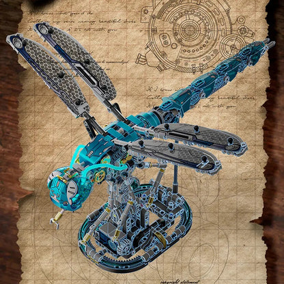Mechanical Dragonfly – MJI 13086 motorised building set – assembled dragonfly on a design-sketch background