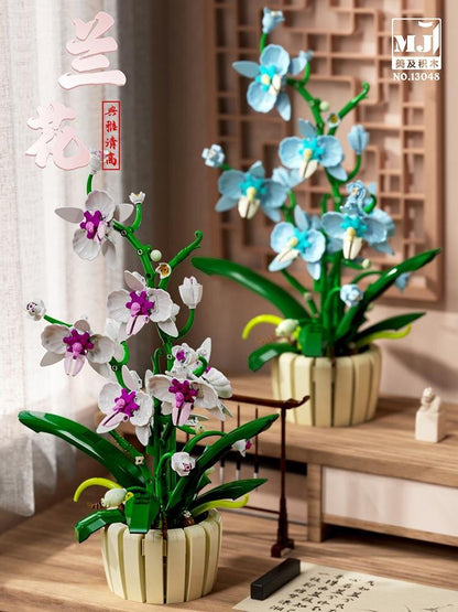 Orchid – MJI 13048 botanical building set – assembled model in a home setting with retail box inset