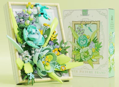 Floating Emerald Flower Picture Frame – MJI 13061 botanical building set – assembled flower frame next to its retail box