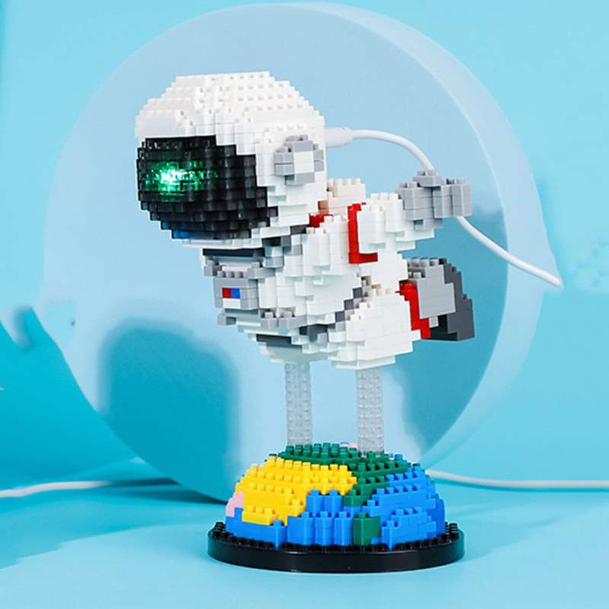 Floating Astronaut – Balody 18361 micro block set – three-quarter view with the USB light cable