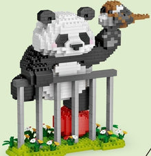 Panda Jailbreak – CLC 6757 micro block set – assembled panda climbing over the bars with a sparrow on its paw