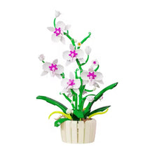 Orchid – MJI 13048 botanical building set – assembled orchid in the white/magenta colour, in its cream slatted pot, on a white background