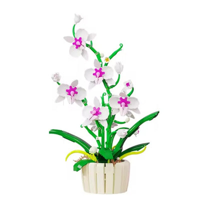 Orchid – MJI 13048 botanical building set – assembled orchid in the white/magenta colour, in its cream slatted pot, on a white background