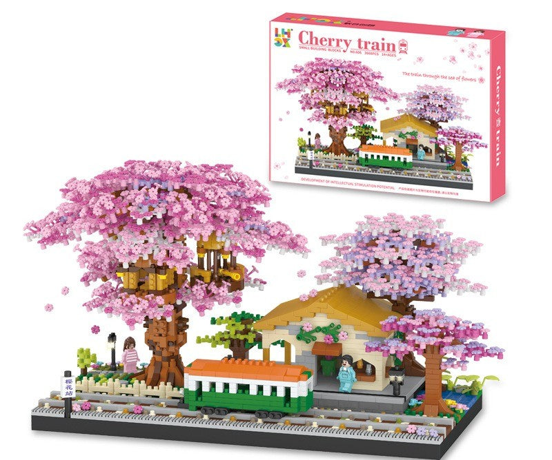 Cherry Blossom Train Station – LHCX 606 micro block set – retail box behind the assembled model