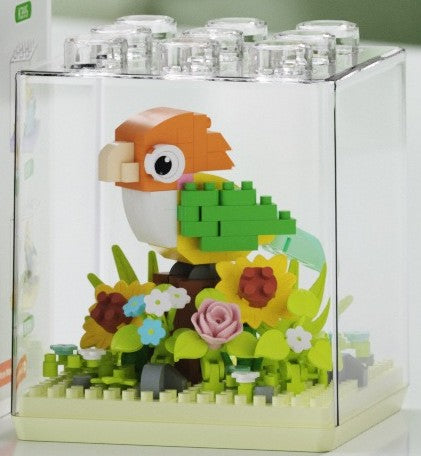 Caique – MEKANSM K395 micro block set – assembled caique in the clear dust cover