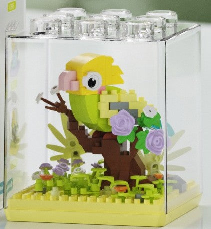 Budgie – MEKANSM K399 micro block set – assembled budgie in the clear dust cover