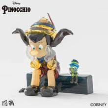 Pinocchio – MGL Toys Disney crystal building block figure – Pinocchio with donkey ears and Jiminy Cricket on a brick wall