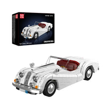 XK140 OTS Sports Car – Mould King 10236 building set – assembled sports car next to its retail box