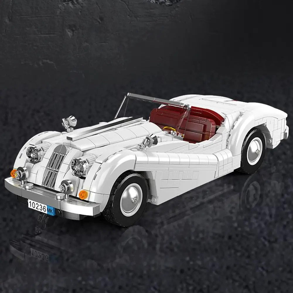 XK140 OTS Sports Car – Mould King 10236 building set – assembled car on a dark background