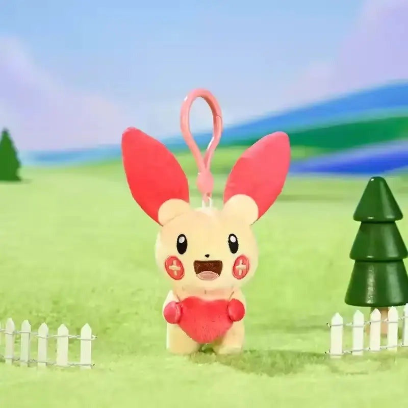 Plusle – Potdemiel Pokémon heart plush keychain – outdoor scene